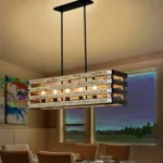 Farmhouse in its elegance, this wood rectangle linear chandelier is one of a kind choice for your home. The rectangle shape has a wooden frame that encases 6 bulbs (not included) with a linear design. Give your kitchen island, dining room, or entryway a refined traditional look with the Era 6 Chandelier. The wood rectangle linear chandelier keeps its farmhouse charms and will shine its brightest when installed in a home with wood nature to strengthen the warmth.