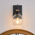This wall sconce blends two styles, American industrial and farmhouse, with a sturdy base for use in wet environments. The mounting direction can be either up or down, and the bulb needs to be purchased on its own. This wall sconce is a big hit with home decor bloggers on instagram, so hopefully this wall sconce fixture will give your home a new look as well.