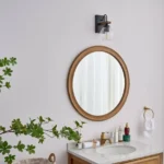 This wall sconce blends two styles, American industrial and farmhouse, with a sturdy base for use in wet environments. The mounting direction can be either up or down, and the bulb needs to be purchased on its own. This wall sconce is a big hit with home decor bloggers on instagram, so hopefully this wall sconce fixture will give your home a new look as well.