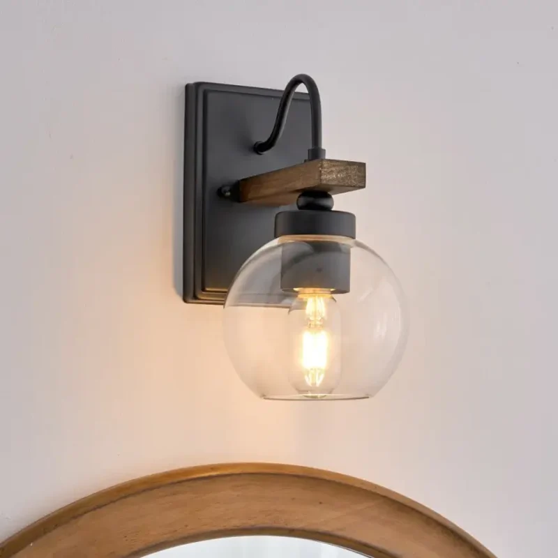 This wall sconce blends two styles, American industrial and farmhouse, with a sturdy base for use in wet environments. The mounting direction can be either up or down, and the bulb needs to be purchased on its own. This wall sconce is a big hit with home decor bloggers on instagram, so hopefully this wall sconce fixture will give your home a new look as well.