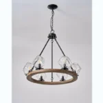 Farmhouse style meets modern minimalist on this Crystal Wood Flyer Chandelier. This vintage-style linear chandelier is compatible with sloped ceilings. 6 irregularly shaped glass lampshade perches on the wooden round base, each designed to house an E12 candelabra base bulb (not included) that adds a candle style to this linear chandelier. Let the warm glow of this embrace you with this farmhouse kitchen island chandelier rustic matte black and wood-like finish.