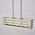 Farmhouse in its elegance, this wood rectangle linear chandelier is one of a kind choice for your home. The rectangle shape has a wooden frame that encases 6 bulbs (not included) with a linear design. Give your kitchen island, dining room, or entryway a refined traditional look with the Era 6 Chandelier. The wood rectangle linear chandelier keeps its farmhouse charms and will shine its brightest when installed in a home with wood nature to strengthen the warmth.