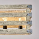 Farmhouse in its elegance, this wood rectangle linear chandelier is one of a kind choice for your home. The rectangle shape has a wooden frame that encases 6 bulbs (not included) with a linear design. Give your kitchen island, dining room, or entryway a refined traditional look with the Era 6 Chandelier. The wood rectangle linear chandelier keeps its farmhouse charms and will shine its brightest when installed in a home with wood nature to strengthen the warmth.