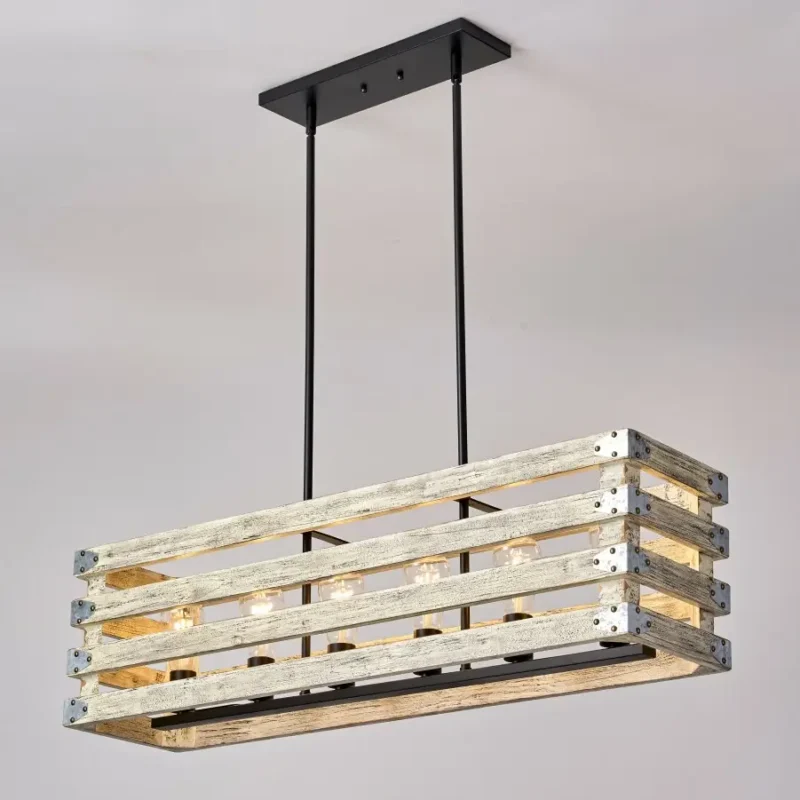 Farmhouse in its elegance, this wood rectangle linear chandelier is one of a kind choice for your home. The rectangle shape has a wooden frame that encases 6 bulbs (not included) with a linear design. Give your kitchen island, dining room, or entryway a refined traditional look with the Era 6 Chandelier. The wood rectangle linear chandelier keeps its farmhouse charms and will shine its brightest when installed in a home with wood nature to strengthen the warmth.