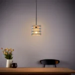 The pendant light’s wood textured framework enhances the farmhouse accent, as well as gives a retro feeling to the house. This light fixture captures the essence of a design era known for its clean lines, organic forms, and functional elegance, now revitalized for today’s discerning tastes. Ideal for a foyer, dining room, kitchen, breakfast nook, entryway, or bedroom in rustic farmhouse-style settings.