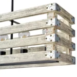 Era 6 Chandelier. Farmhouse in its elegance, this wood rectangle linear chandelier is one of a kind choice for your home. The rectangle shape has a wooden frame that encases 6 bulbs (not included) with a linear design. Give your kitchen island, dining room, or entryway a refined traditional look with the Era 6 Chandelier. The wood rectangle linear chandelier keeps its farmhouse charms and will shine its brightest when installed in a home with wood nature to strengthen the warmth.