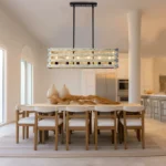 Farmhouse in its elegance, this wood rectangle linear chandelier is one of a kind choice for your home. The rectangle shape has a wooden frame that encases 6 bulbs (not included) with a linear design. Give your kitchen island, dining room, or entryway a refined traditional look with the Era 6 Chandelier. The wood rectangle linear chandelier keeps its farmhouse charms and will shine its brightest when installed in a home with wood nature to strengthen the warmth.