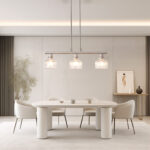 A minimalist masterpiece that seamlessly blends captivating design with functional brilliance, this chandelier transcends the ordinary. Featuring hand-blown glass pendant that commands attention from above, this chandelier will effortlessly accent a space of any size. Suspended elegantly from a sleek metal, the chandelier allows light to playfully dance within its clear glass confines, creating a mesmerizing interplay of shadows and illumination. Combining high-quality metal construction and adjustable height functionality, this pendant light fixture offers a unique lighting experience.