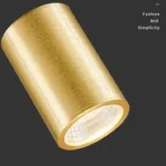 This pendant light has a light source at each end and three frosted glass discs in the center, which allows for better light distribution.