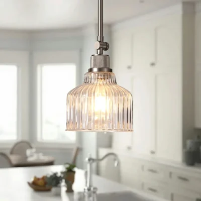When it comes to overhead lighting, pendant lights are a fan favorite – and for good reason. They don’t take up prime real estate, they offer options for up and downlighting, they work well solo and in clusters, and they come in an endless amount of styles! Take this one-light pendant, for instance: a downward-facing clear glass dome shade gives this mini pendant a traditional look, perfect for any aesthetic and area of your home.This pendant light combines high-quality metal construction with adjustable angle functionality to provide a unique lighting experience.We wish it would be more than a hanging light but also an art decor.