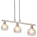 A minimalist masterpiece that seamlessly blends captivating design with functional brilliance, this chandelier transcends the ordinary. Featuring hand-blown glass pendant that commands attention from above, this chandelier will effortlessly accent a space of any size. Suspended elegantly from a sleek metal, the chandelier allows light to playfully dance within its clear glass confines, creating a mesmerizing interplay of shadows and illumination. Combining high-quality metal construction and adjustable height functionality, this pendant light fixture offers a unique lighting experience.