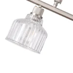 A minimalist masterpiece that seamlessly blends captivating design with functional brilliance, this chandelier transcends the ordinary. Featuring hand-blown glass pendant that commands attention from above, this chandelier will effortlessly accent a space of any size. Suspended elegantly from a sleek metal, the chandelier allows light to playfully dance within its clear glass confines, creating a mesmerizing interplay of shadows and illumination. Combining high-quality metal construction and adjustable height functionality, this pendant light fixture offers a unique lighting experience.