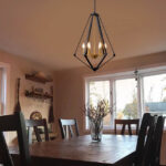 Diamond Epazo Pendant Light is a very American industrial style pendant light, the overall frame is made of black stainless steel with an openwork diamond frame, the center base is made of brass in the shape of a candelabra, and there are a total of six light sources to provide illumination, which is perfect for your minimalist home décor.