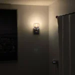 This wall sconce blends two styles, American industrial and farmhouse, with a sturdy base for use in wet environments. The mounting direction can be either up or down, and the bulb needs to be purchased on its own. This wall sconce is a big hit with home decor bloggers on instagram, so hopefully this wall sconce fixture will give your home a new look as well.
