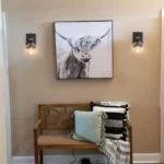This wall sconce blends two styles, American industrial and farmhouse, with a sturdy base for use in wet environments. The mounting direction can be either up or down, and the bulb needs to be purchased on its own. This wall sconce is a big hit with home decor bloggers on instagram, so hopefully this wall sconce fixture will give your home a new look as well.