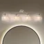 Ever wondered how to ramp up the revival vibes in your space? We’ve got the answer. Glam in style, the Wave Crystal 4 Wall Sconce is ideal for eclectic or contemporary home decor. A classic simple clear body color with a metal base without getting oxidation & color fading for years of use, which is suitable for humid environments. Glass lampshade adopts the traditional hand glassblowing, releasing bright light effect. Clear glass shade reveals the bulb and maximizes its light.
