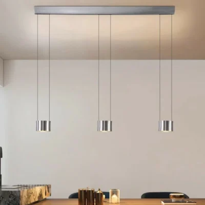 Frey Lens 3 Pendant Light contains 6 light sources with an illumination area of 15-30 ㎡, making it ideal for your living room. The lampshade is made of aluminum and glass. After repeated polishing and polishing processes, the surface of the lamp body presents a luxurious metallic texture.