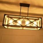 Full of modern farmhouse style, this Cuca Chandelier features a classic rectangular silhouette with 4 exposed lights(Not included) that will enhance the brightness of any room. It features not only exposed light bulbs, but a wooden rectangular frame with black metal lines crisscrossing the middle, giving it a farmhouse style yet an industrial aesthetic. We love to hang this farmhouse wheel chandelier in a living room, dining room, kitchen island, and entryway to enjoy a chic farmhouse look.