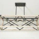 Full of modern farmhouse style, this Cuca Chandelier features a classic rectangular silhouette with 4 exposed lights(Not included) that will enhance the brightness of any room. It features not only exposed light bulbs, but a wooden rectangular frame with black metal lines crisscrossing the middle, giving it a farmhouse style yet an industrial aesthetic. We love to hang this farmhouse wheel chandelier in a living room, dining room, kitchen island, and entryway to enjoy a chic farmhouse look.
