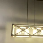 Full of modern farmhouse style, this Cuca Chandelier features a classic rectangular silhouette with 4 exposed lights(Not included) that will enhance the brightness of any room. It features not only exposed light bulbs, but a wooden rectangular frame with black metal lines crisscrossing the middle, giving it a farmhouse style yet an industrial aesthetic. We love to hang this farmhouse wheel chandelier in a living room, dining room, kitchen island, and entryway to enjoy a chic farmhouse look.